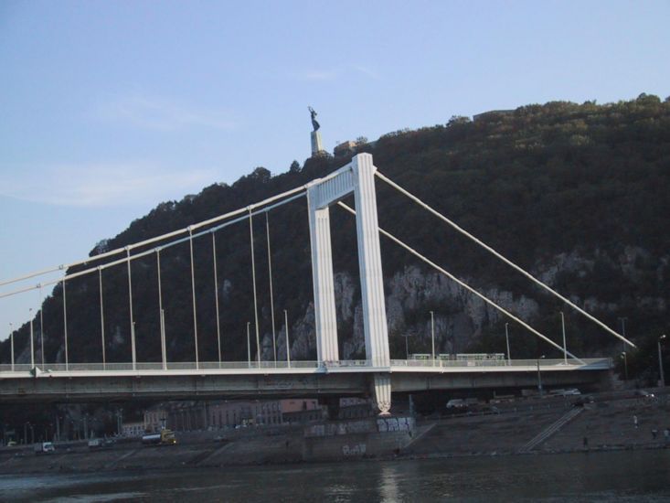 Bridge with statue in background, Budapest