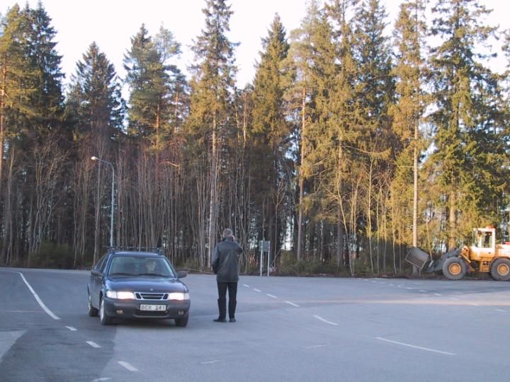 Near Volvo truck-cab plant in Umeå, Sweden-- River Ume behind trees