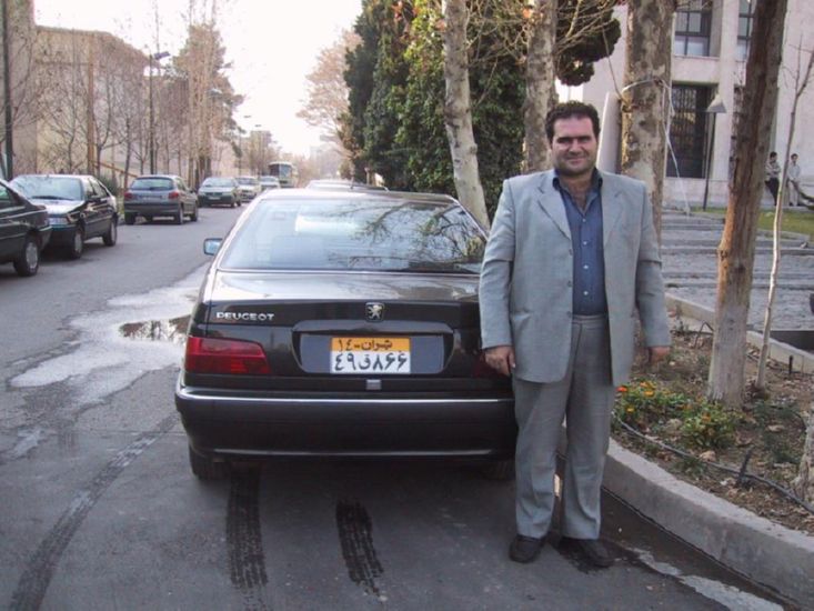 Our excellent driver and Iran-built Peugeot -- we also travelled all over Tehran